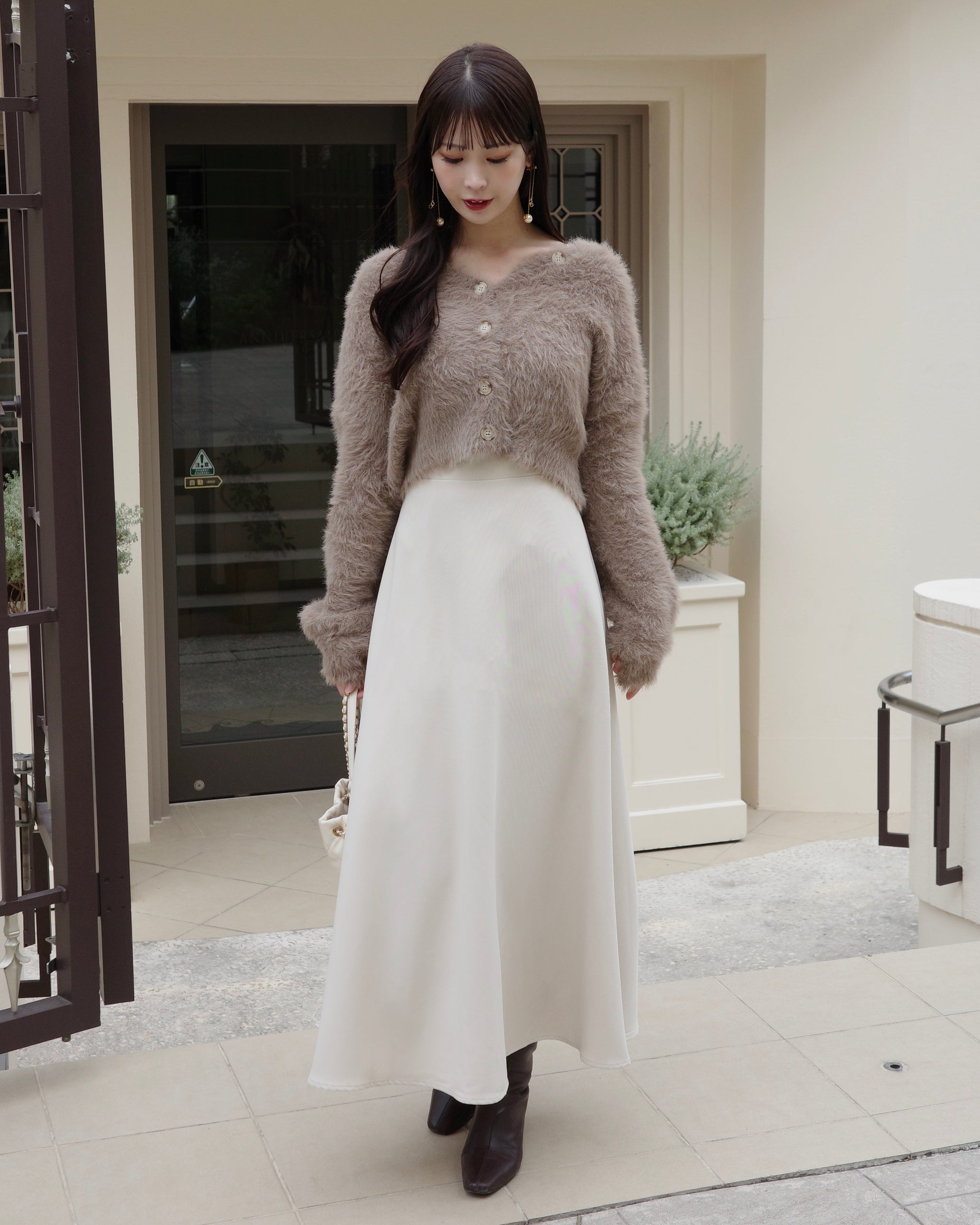 UNITED TOKYO ファー付きニットロングカーデ UNITED TOKYO（ユナイテッドトウキョウ）の「ファー付きニットロング